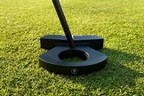The L.A.B. Golf DF3 putter has the "gimme getter" so you can pick up your ball