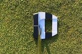 The Odyssey Ai-One Square 2 Square Jailbird putter shaft enters at the centre of the putter head