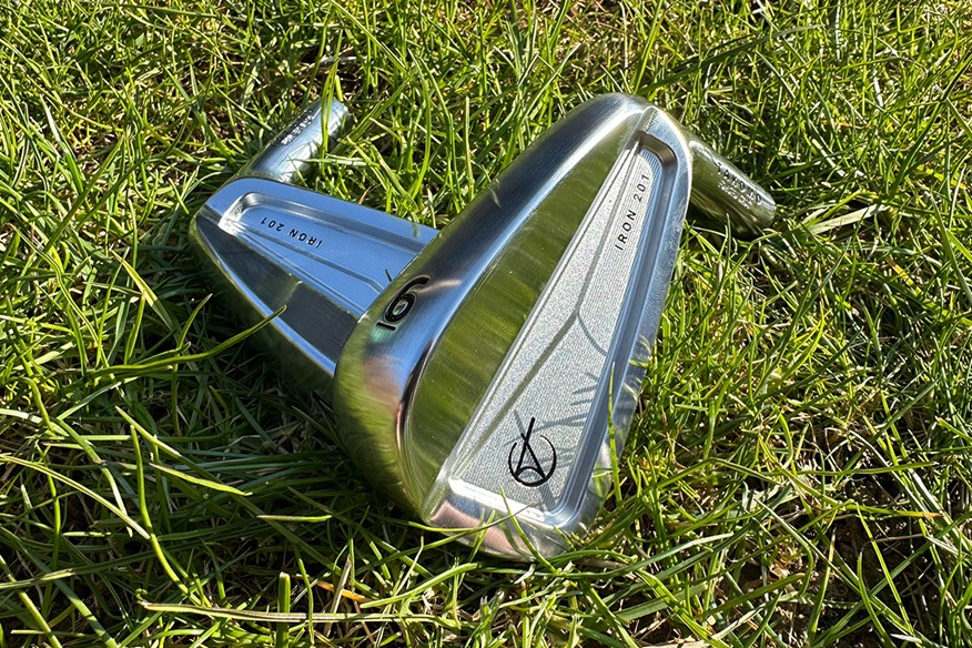 The Takomo 201 iron head features a cut cavity